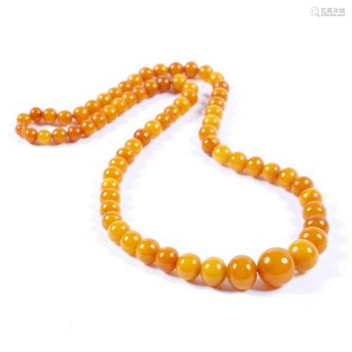 Amber bead necklace the continuous string of graduated amber beads measuring approximately 8mm to