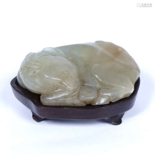 Mutton fat jade pebble Chinese, 18th/19th Century carved as a reclining buffalo with head over