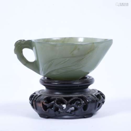 Green jade peach shaped cup Chinese 18th/19th Century with floral branch handle and floral foot 3.