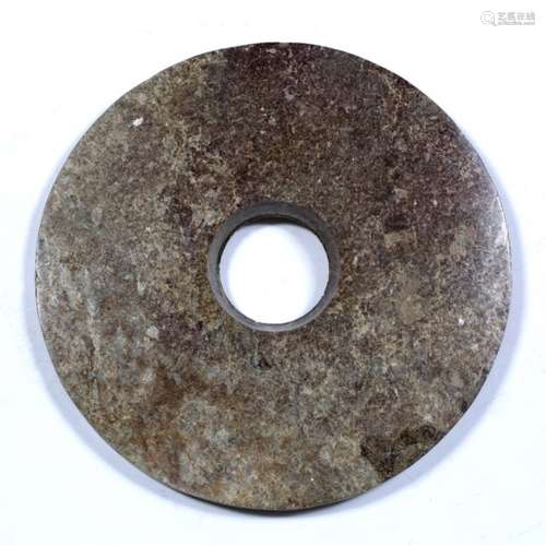 Bi disc Chinese, Neolithic period of pinkish brown grained stone, the centre hole carved from both