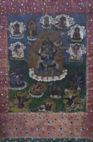 Thangka Tibetan central Vajrabhairava and further deities within a fabric surround, framed 98cm x