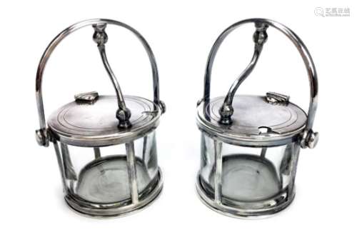 A PAIR OF GLASS MUSTARD POTS WITH MOUNTS BY FELIX FRERES