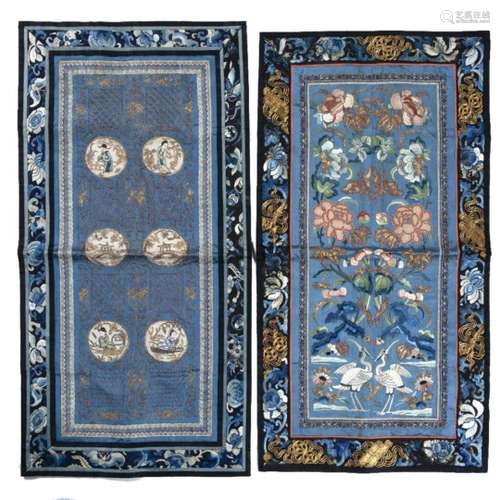 Two blue ground silk panels Chinese, late 19th Century one embroidered with two storks, the other