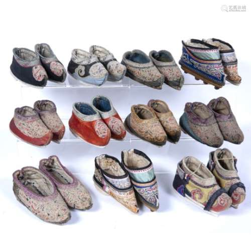 Eleven pairs of children's embroidered shoes Chinese, 19th/20th Century each embroidered with Peking