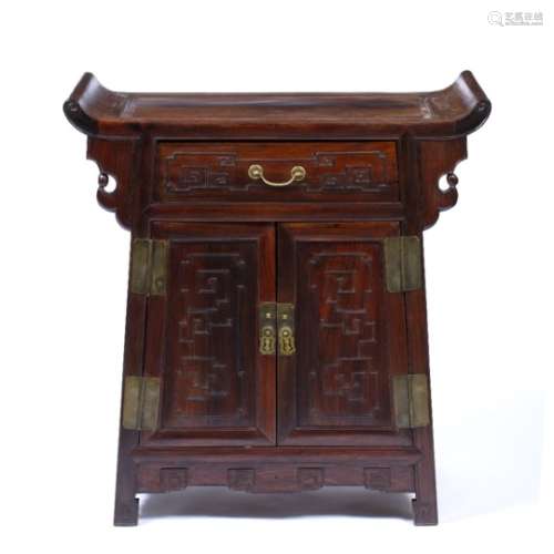 Hongmu altar cabinet Chinese, 19th/20th Century carved with a scroll top, with a single long