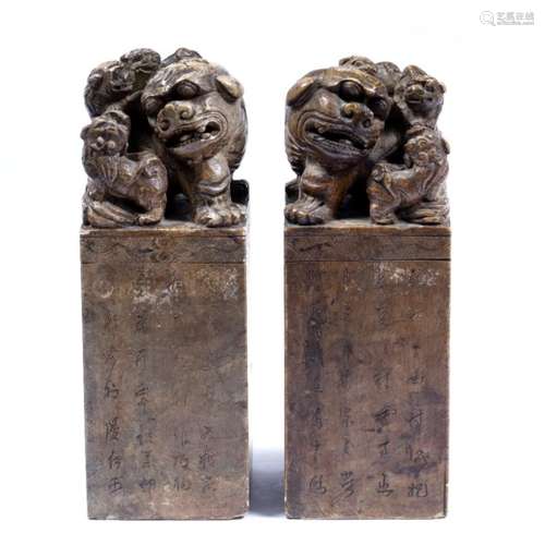 Pair of large soapstone seals Chinese, 19th Century with temple dog mounts and calligraphy to one