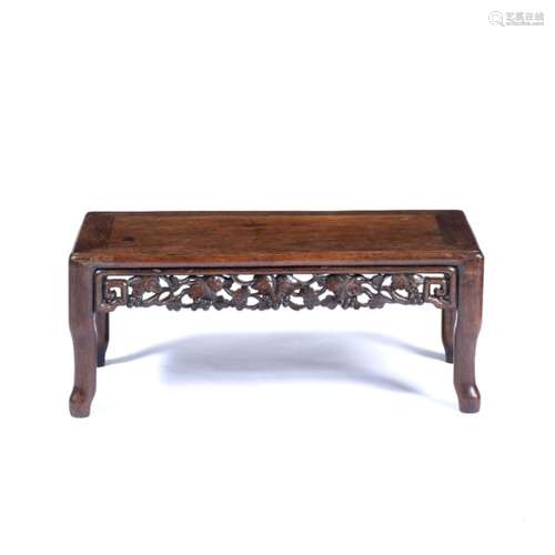 Matched pair of hardwood kang tables Chinese19th/early 20th Century each with a carved fruit