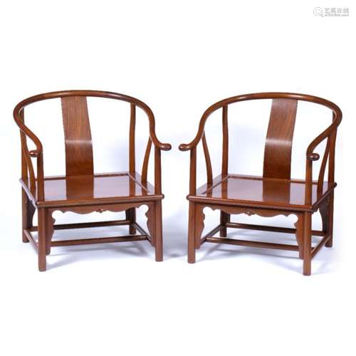 Pair of hardwood horse shoe back chairs Chinese, 20th Century each with panel seat 74cm high x