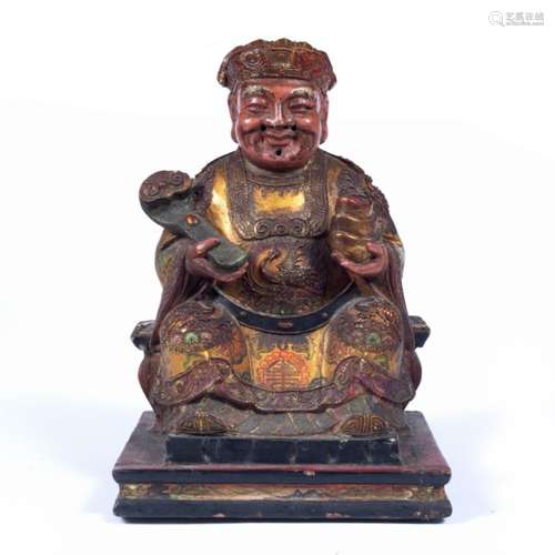 Carved and lacquered seated Buddha Chinese 19th/20th Century the figure holding a ruyi sceptre and