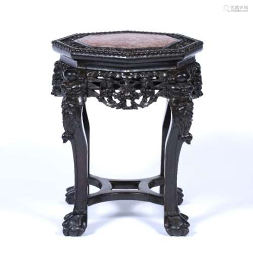Rosewood urn stand Chinese, late 19th Century of octagonal form with inset marble top 38cm