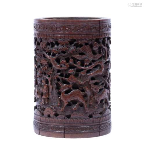Bamboo brush pot Chinese, 19th Century carved with scholars and other figures set beneath pine trees