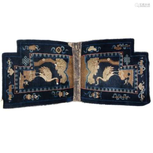 Blue ground saddle rug Chinese/Tibetan each panel having a bird within a surround of 'Antiques'