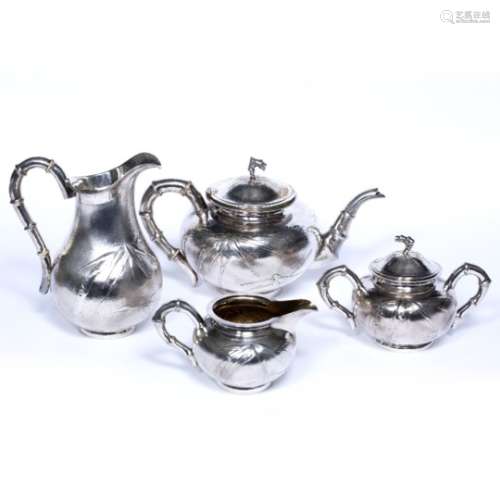 Silver four piece tea service Chinese, 20th Century comprising of a teapot, large jug, a sugar