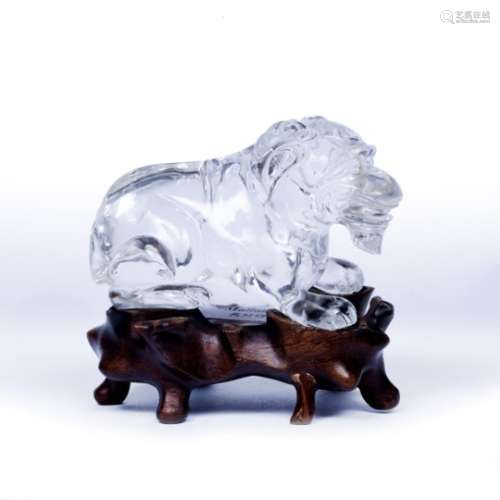 Rock crystal carving of a recumbent Dog of Fo Chinese, 20th Century on fitted wood stand 11cm x 7cm