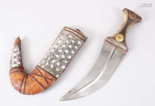 A GOOD PERSIAN JAMBYA DAGGER, with a wooden handle & white metal mounted sheath, 32cm long,