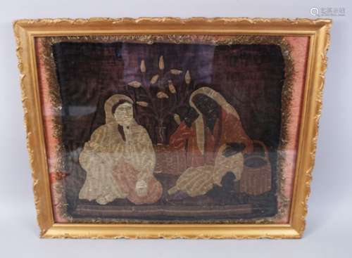 A 19TH CENTURY OTTOMAN TURKISH EMBROIDED PICTURE OF TWO LADIES sitting with a vase of plants between