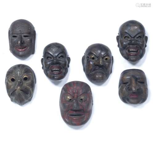 Group of seven large lacquer noh masks Japanese, Edo period approx. 20cm high