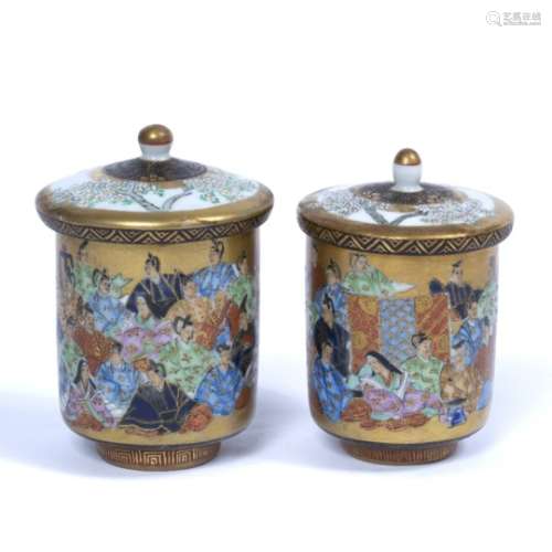 Pair of Kutani porcelain cylindrical teacups and covers Japanese, 19th Century decorated with