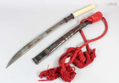 A 19TH CENTURY BURMESE IVORY HILTED SILVER MOUNTED DHA SWORD, with metal scabbard and rope, 84cm