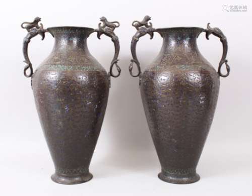 A PAIR OF LARGE 19TH CENTURY INDIAN KASHMIRI ENAMELLED COPPER TWIN HANDLED VASES.