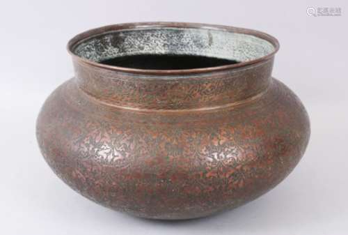 A LARGE 18TH - 19TH CENTURY INDO PERSIAN ENGRAVED COPPER BOWL.