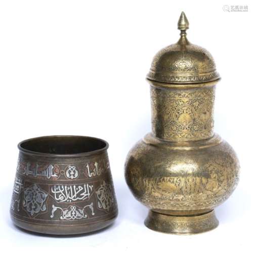 Two pieces of Islamic metal ware to include a Cairo ware bucket with gold inlay in nastiliq script