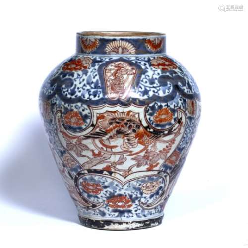 Imari baluster vase Japanese, early 18th Century decorated to the centre in red and blues