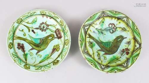 TWO GOOD 17TH CENTURY OTTOMAN IZNIK CERAMIC DISHES, both the dishes decorated with scenes of
