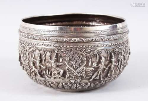 A FINE 19TH CENTURY BURMESE SOLID SILVER BOWL, the bowl with an array of pressed figure and formal