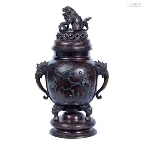 Bronze large vase and cover Japanese, late 19th Century with raised birds and blossom and having a