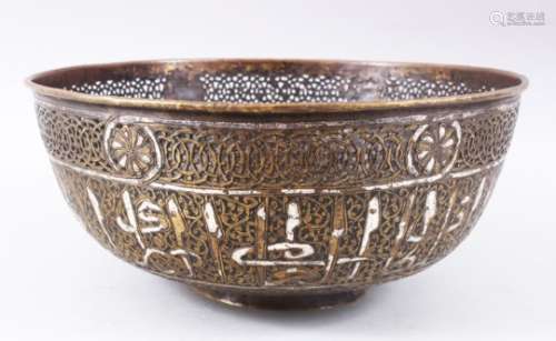 A LARGE 19TH CENTURY OR EARLIER SILVER INLAID BRASS MAMLUK REVIVAL BOWL, the body of the bowl with