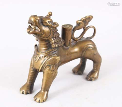 A FINE 15TH - 17TH CENTURY TIBETAN BRONZE FIGURE OF A LION / INCENSE, stood in a striking pose, 11cm