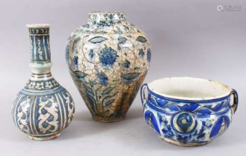 THREE GOOD PERSIAN BLUE & WHITE POTTERY VASES / ITEMS, consisting of two vases and a bowl, with