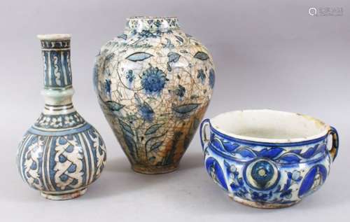 THREE GOOD PERSIAN BLUE & WHITE POTTERY VASES / ITEMS, consisting of two vases and a bowl, with