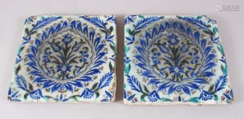 A PAIR OF 17TH CENTURY OTTOMAN IZNIK STYLE DAMASCUS GLAZED POTTERY TILES, both with floral