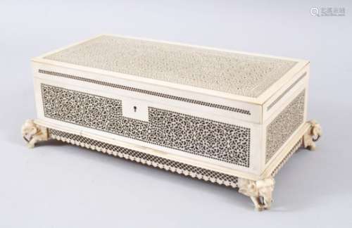 A FINE 19TH CENTURY INDIAN CARVED IVORY OPEN WORK CRACKER / BOX, with fine carved elephant head