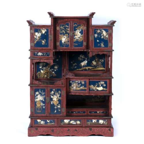 Cinnabar and black lacquer Hatsunedana Japanese, Meiji period fitted cupboards and drawers in two