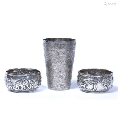 White metal beaker Indian with paisley type engraved pattern 12cm high and a pair of Burmese white