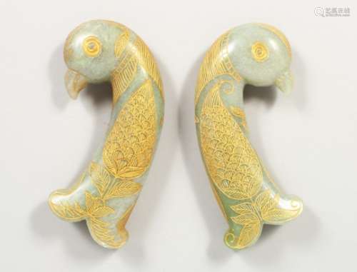 A GOOD PAIR OF EARLY 20TH CENTURY INDIAN / PERSIAN CARVED JADE DAGGER KHANJAR HANDLE, the body of
