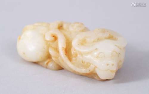 A GOOD 19TH / 20TH CENTURY CHINESE CARVED PALE CELADON JADE BUFFALO FIGURE, in recumbent position,