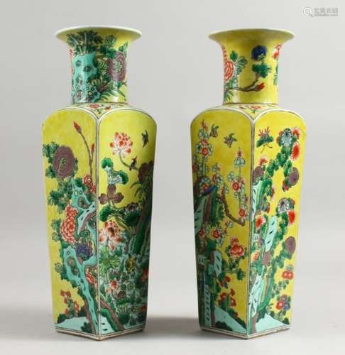 A GOOD PAIR OF 19TH CENTURY CHINESE FAMILLE JAUNE SQUARE TAPERING VASES painted with panels of