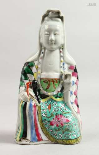 AN 18TH CENTURY FAMILLE ROSE FIGURE OF GUANYIN. 8ins high.