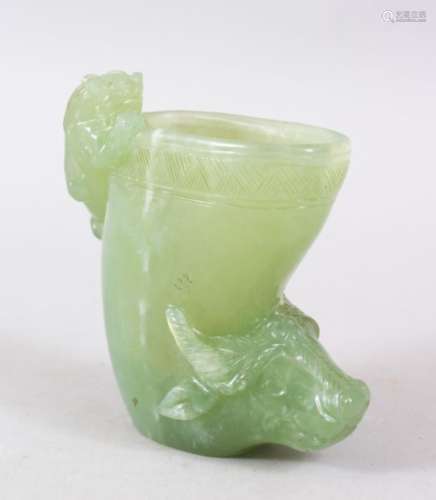 A GOOD CHINESE CARVED JADE / JADE LIKE LIBATION TYPE CUP, with a kylin and water buffalo, 10cm