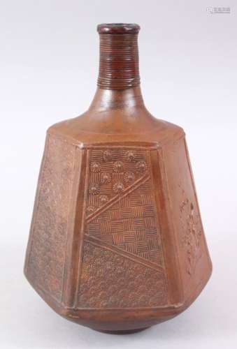 AN UNUSUAL JAPANESE MID - LATE EDO PERIOD STONEWARE SAKE BOTTLE, the bottle of hexagonal form with