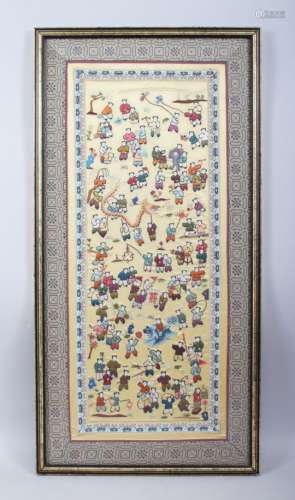 A 20TH CENTURY CHINESE EMBROIDERED SILK DEPICTING BOYS, the framed silk depicting multiple images of