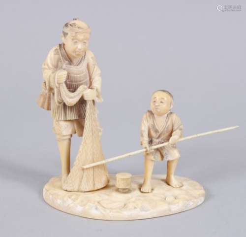 A JAPANESE MEIJI PERIOD CARVED IVORY OKIMONO OF FISHERMAN & BOY, the fisherman stood upon a carved