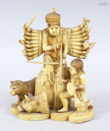 A 19TH CENTURY ORIENTAL CARVED IVORY SECTIONAL FIGURE OF A MULTI ARMED GOD WITH A YOUNG BOY AND