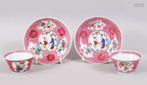 A PAIR OF YONGZHENG CHINESE FAMILLE ROSE PORCELAIN TEA BOWLS & SAUCERS, decorated on a pink ground