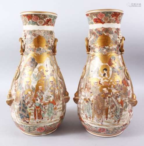 A GOOD PAIR OF JAPANESE MEIJI PERIOD MOULDED SATSUMA VASES, the body of the vases decorated in