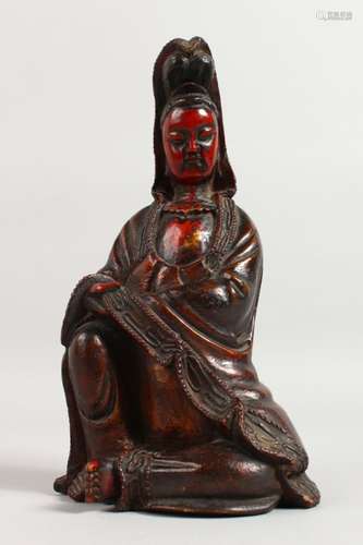 AN 18TH CENTURY CARVED AND GILDED FIGURE OF GUANYIN. 10ins high.